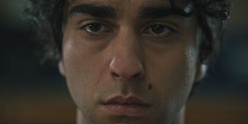 Movie still from “Hereditary” (2018), directed by Ari Aster – A person's face with water drops on them; Extreme Close Up shot, Low angle