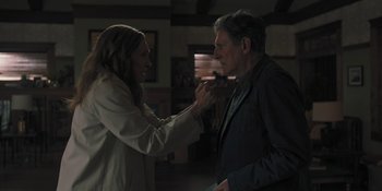 Movie still from “Hereditary” (2018), directed by Ari Aster – A man and a woman are looking at each other; Medium shot, Over the shoulder angle