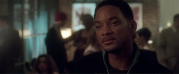 Movie still from “Hitch” (2005), directed by Andy Tennant – Will smith in a black shirt; Close Up shot, Over the shoulder angle
