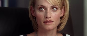 Movie still from “Hitch” (2005), directed by Andy Tennant – A woman's face with a lot of makeup; Close Up shot, Low angle