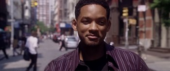 Movie still from “Hitch” (2005), directed by Andy Tennant – A person wearing a shirt; Close Up shot, Over the shoulder angle