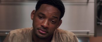 Movie still from “Hitch” (2005), directed by Andy Tennant – Will smith's face as he stares into the distance; Close Up shot, High angle
