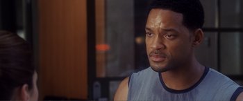 Movie still from “Hitch” (2005), directed by Andy Tennant – Will smith's face as he stares into the distance; Close Up shot, Over the shoulder angle