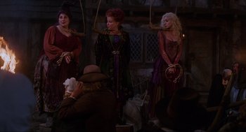 Movie still from “Hocus Pocus” (1993), directed by Kenny Ortega – A group of women dressed up as hocus pocus; Medium shot, High angle