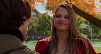Movie still from “Hocus Pocus” (1993), directed by Kenny Ortega – A young woman with long brown hair is talking to a young man; Close Up shot, Over the shoulder angle