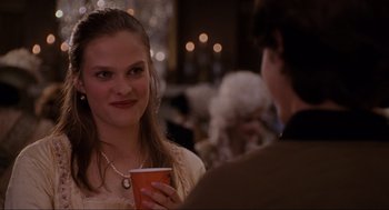 Movie still from “Hocus Pocus” (1993), directed by Kenny Ortega – A woman holding a cup and talking to a man; Close Up shot, Over the shoulder angle