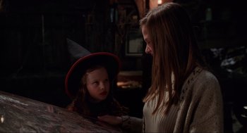 Movie still from “Hocus Pocus” (1993), directed by Kenny Ortega – A woman and a little girl dressed as a witch; Close Up shot, Over the shoulder angle