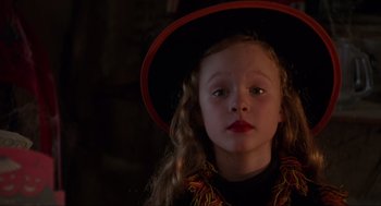 Movie still from “Hocus Pocus” (1993), directed by Kenny Ortega – A little girl wearing a witch's hat; Close Up shot, High angle