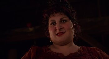 Movie still from “Hocus Pocus” (1993), directed by Kenny Ortega – A person wearing a red dress; Close Up shot, Low angle