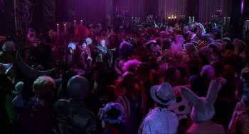 Movie still from “Hocus Pocus” (1993), directed by Kenny Ortega – A crowd of people in costumes at a halloween party; Extreme Wide shot, High angle