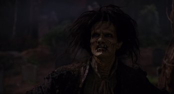 Movie still from “Hocus Pocus” (1993), directed by Kenny Ortega – A person wearing a costume; Close Up shot, Low angle