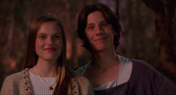 Movie still from “Hocus Pocus” (1993), directed by Kenny Ortega – A young woman standing next to a young man; Close Up shot, Low angle