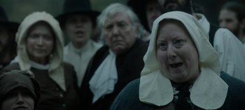 Movie still from “Hocus Pocus 2” (2022), directed by Anne Fletcher – A group of people wearing hats and cloths; Close Up shot, Over the shoulder angle