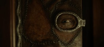 Movie still from “Hocus Pocus 2” (2022), directed by Anne Fletcher – A person's eye in a leather jacket; Extreme Close Up shot, Overhead angle