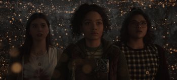 Movie still from “Hocus Pocus 2” (2022), directed by Anne Fletcher – A group of people standing next to each other in a room; Medium shot, Low angle