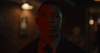 Movie still from “Hollywood Stargirl” (2022), directed by Julia Hart – A young man is looking into the camera; Close Up shot, Low angle