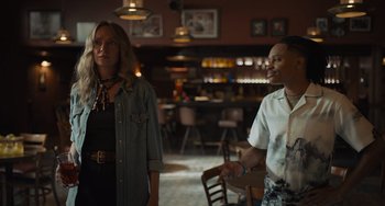 Movie still from “Hollywood Stargirl” (2022), directed by Julia Hart – Two people standing in a room next to each other; Medium shot, Over the shoulder angle