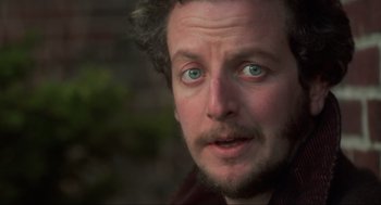 Movie still from “Home Alone” (1990), directed by Chris Columbus – A person with blue eyes; Close Up shot, Low angle