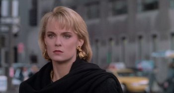 Movie still from “Home Alone 2: Lost in New York” (1992), directed by Chris Columbus – A person wearing a black jacket; Close Up shot, Low angle