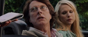 Movie still from “Hot Fuzz” (2007), directed by Edgar Wright – An older man wearing glasses looking up at the sky; Close Up shot, Over the shoulder angle