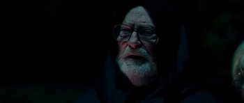 Movie still from “Hot Fuzz” (2007), directed by Edgar Wright – An old man wearing glasses and a hooded jacket; Close Up shot, High angle