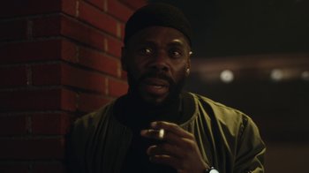 Movie still from “Euphoria” (2019), created by Sam Levinson – A man with a beard is smoking a cigarette; Close Up shot, Low angle