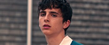 Movie still from “Hot Summer Nights” (2017), directed by Elijah Bynum – A person with a beard; Close Up shot, Low angle
