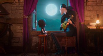 Movie still from “Hotel Transylvania 4: Transformania” (2022), directed by Jennifer Kluska – A man and a woman sitting in front of a window; Medium shot, Low angle