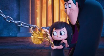 Movie still from “Hotel Transylvania 4: Transformania” (2022), directed by Jennifer Kluska – A woman and a man holding a lock and keys; Medium shot, Over the shoulder angle