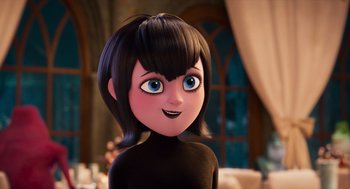 Movie still from “Hotel Transylvania 4: Transformania” (2022), directed by Jennifer Kluska – A cartoon girl with blue eyes and black hair; Close Up shot, Over the shoulder angle