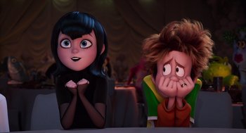 Movie still from “Hotel Transylvania 4: Transformania” (2022), directed by Jennifer Kluska – A couple of people that are next to each other; Medium shot, Over the shoulder angle