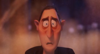 Movie still from “Hotel Transylvania 4: Transformania” (2022), directed by Jennifer Kluska – An animated man with a sad look on his face; Close Up shot, Over the shoulder angle