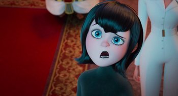 Movie still from “Hotel Transylvania 4: Transformania” (2022), directed by Jennifer Kluska – A doll with blue eyes and black hair; Close Up shot, Over the shoulder angle