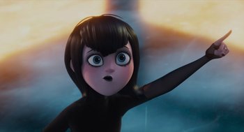 Movie still from “Hotel Transylvania 4: Transformania” (2022), directed by Jennifer Kluska – A cartoon of a woman with a black outfit on; Close Up shot, Low angle