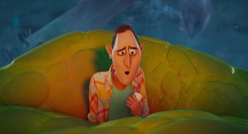 Movie still from “Hotel Transylvania 4: Transformania” (2022), directed by Jennifer Kluska – An animated man is sitting on a pillow; Close Up shot, High angle