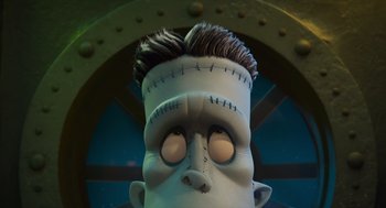Movie still from “Hotel Transylvania 4: Transformania” (2022), directed by Jennifer Kluska – The head of a frankenstein doll; Medium shot, Low angle