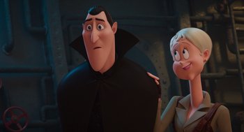 Movie still from “Hotel Transylvania 4: Transformania” (2022), directed by Jennifer Kluska – A man and a woman are standing next to each other; Close Up shot, Low angle