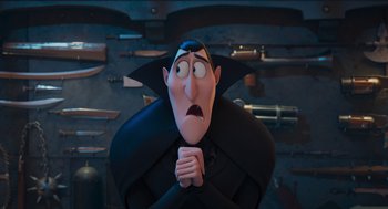 Movie still from “Hotel Transylvania 4: Transformania” (2022), directed by Jennifer Kluska – A cartoon character with his hands clasped together; Medium shot, Over the shoulder angle