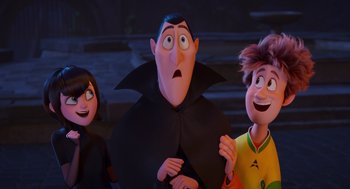 Movie still from “Hotel Transylvania 4: Transformania” (2022), directed by Jennifer Kluska – A group of people standing next to each other in a room; Medium shot, Over the shoulder angle