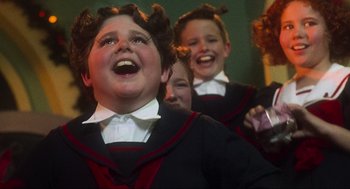 Movie still from “How the Grinch Stole Christmas” (2000), directed by Ron Howard – A group of children dressed up in costumes; Close Up shot, Low angle