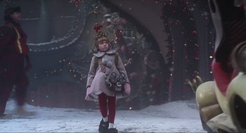 Movie still from “How the Grinch Stole Christmas” (2000), directed by Ron Howard – A little girl dressed up in a christmas costume; Medium shot, Low angle