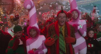 Movie still from “How the Grinch Stole Christmas” (2000), directed by Ron Howard – A group of people dressed up in costumes for a party; Medium shot, Low angle