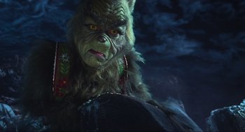 Movie still from “How the Grinch Stole Christmas” (2000), directed by Ron Howard – The head of the grinch; Close Up shot, Over the shoulder angle