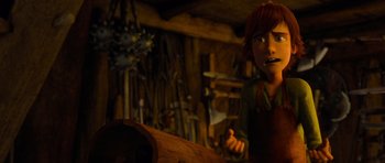 Movie still from “How to Train Your Dragon” (2010), directed by Chris Sanders – An image of a man in a wood shop; Medium shot, Low angle