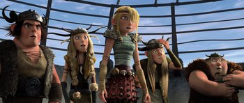 Movie still from “How to Train Your Dragon” (2010), directed by Chris Sanders – A group of people standing next to each other in a room; Medium shot, Low angle