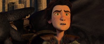 Movie still from “How to Train Your Dragon” (2010), directed by Chris Sanders – A person's face in a scene from a movie; Close Up shot, Over the shoulder angle