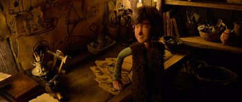 Movie still from “How to Train Your Dragon” (2010), directed by Chris Sanders – A doll's face in a room; Medium shot, High angle