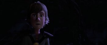 Movie still from “How to Train Your Dragon” (2010), directed by Chris Sanders – A young boy is looking up at the sky; Close Up shot, Over the shoulder angle