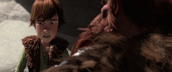 Movie still from “How to Train Your Dragon” (2010), directed by Chris Sanders – A person's face and a troll face; Close Up shot, Over the shoulder angle