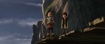 Movie still from “How to Train Your Dragon” (2010), directed by Chris Sanders – A couple of people standing next to each other; Wide shot, Low angle